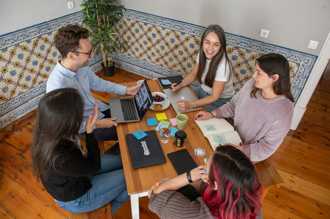 colleagues in office meeting